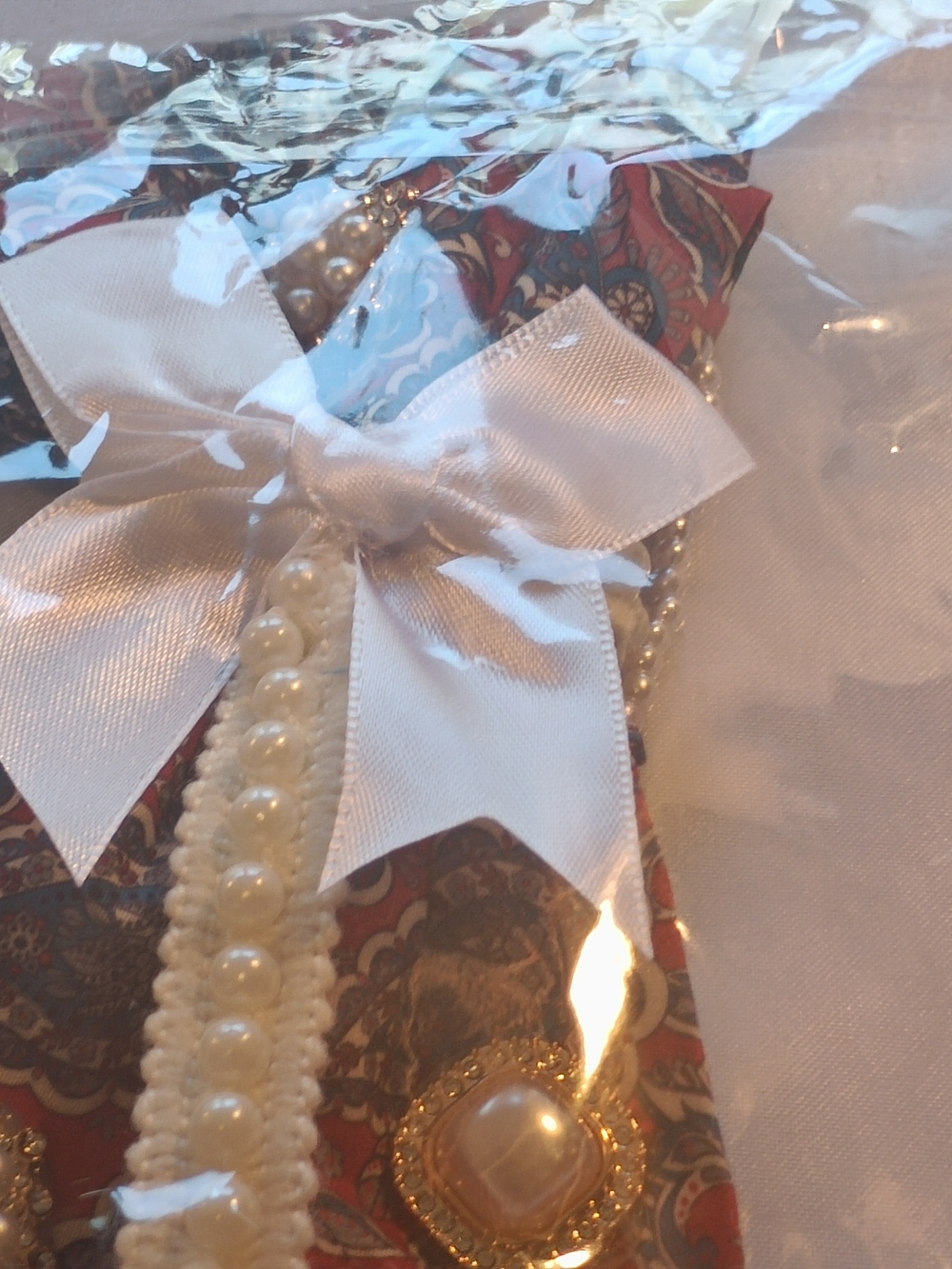 Pearl-Trimmed Red Paisley JunkTie Necklace Accessory with White Bow
